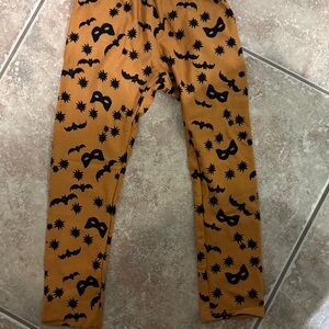 Dot Dot Smile Orange Leggings with Black Bat Print